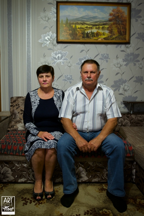 Portait of a liquidator and is wife in ther very "Ukrainian" home.